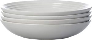 Close-up of Le Creuset pasta bowls showing color and design