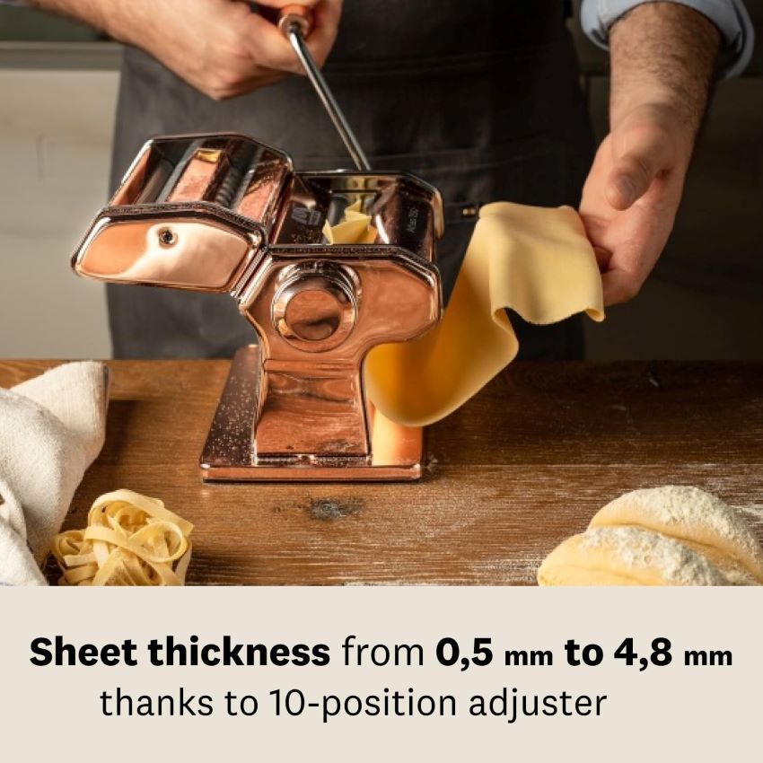 Marcato Atlas 150 pasta maker on a kitchen counter, making authentic Italian pasta at home.