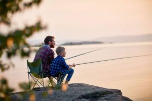 Child learning to fish with a beginner-friendly fishing rod and reel