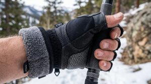 Close-up of durable neoprene fishing gloves showing textured grip and stitching.