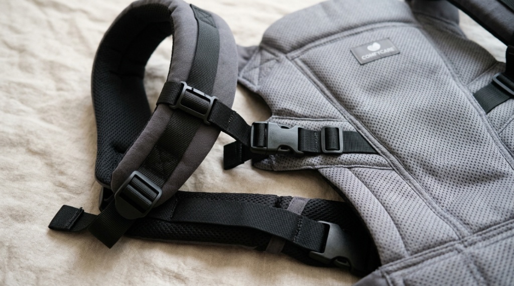 Close-up of adjustable straps on an affordable plus-size baby carrier.